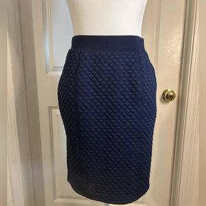 Pre owned worn once! Uniqlo Navy quilted pencil skirt. 20 1/2 inches long.